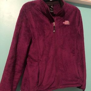 Purple North Face jacket.